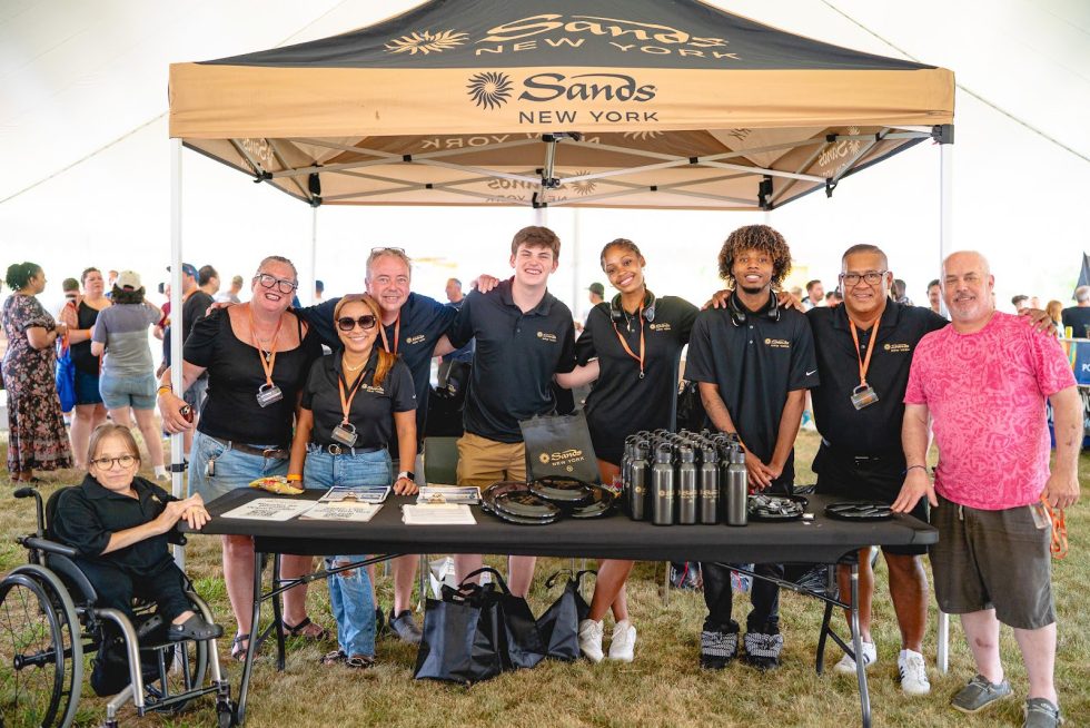 Sands New York table and staff at the East Meadow Fire Fest.