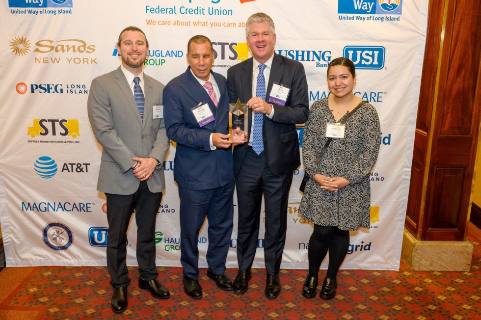 Former New York State Governor and Sands Senior Vice President David Paterson and Sands Senior Vice President Ron Reese with United Way staff and the Corporate Impact Champion award.