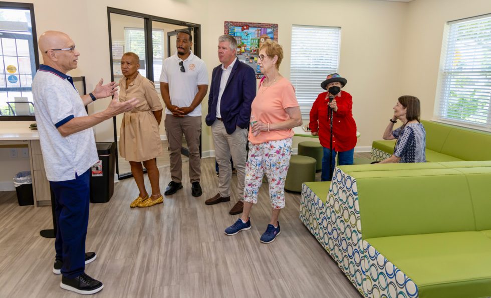 Ron Reese, Senior Vice President for Las Vegas Sands, with staff at the John J. Byrne Community Center in Uniondale.